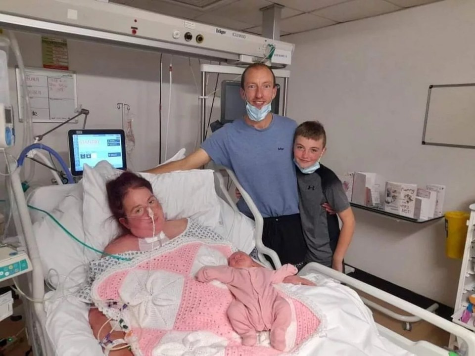 Laura, when she came round from her coma - with partner John, Hope and Alex