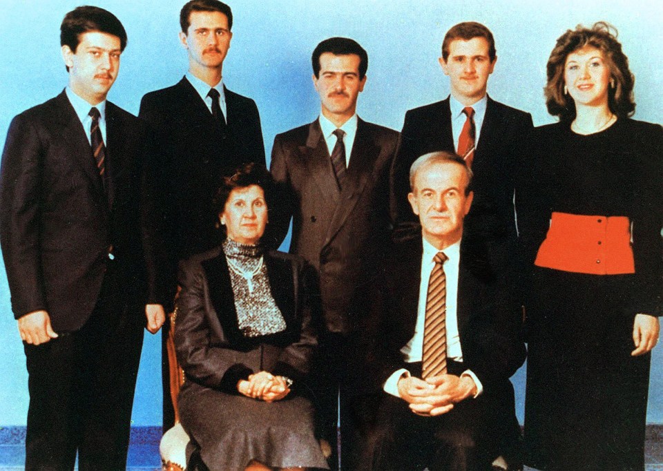 A young Bashar (second from top left) pictured with his parents and brothers