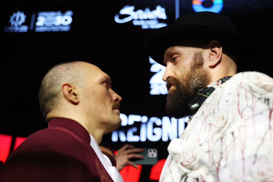 Oleksandr Usyk facing off with