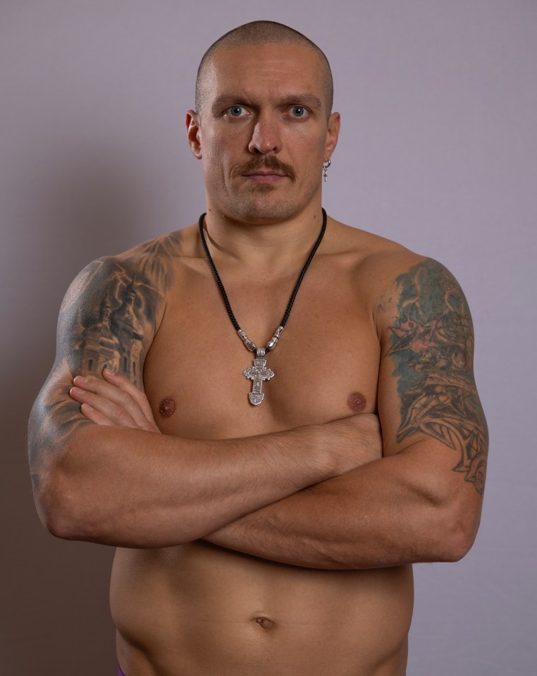 Oleksandr Usyk shows off his impressive tattoos and chiselled torso