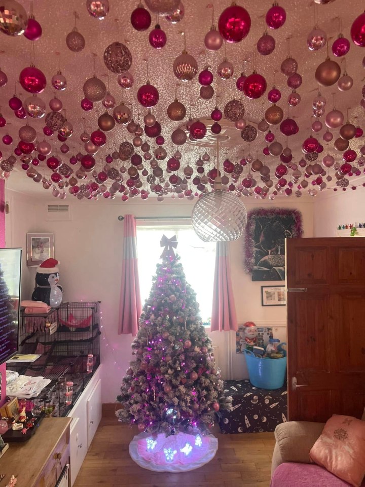 Every year, she puts them individually up on her ceiling using drawing pins