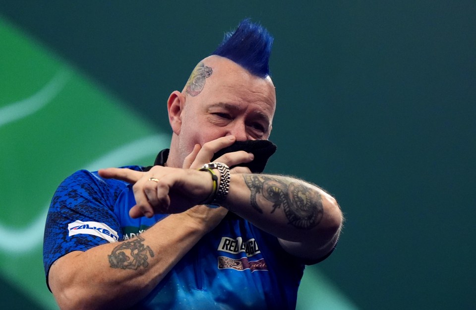 Peter Wright battled his way to the last-16 of the PDC World Championships