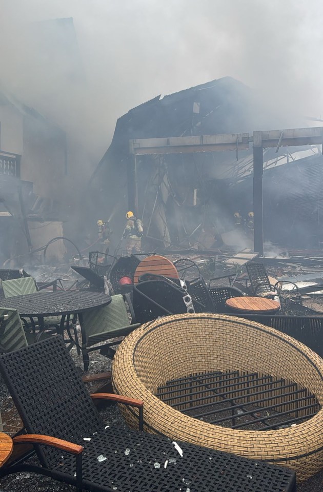 Handout picture released by Rio Grande do Sul Fire Department showing firefighters working on the site of a plane crash in Gramado