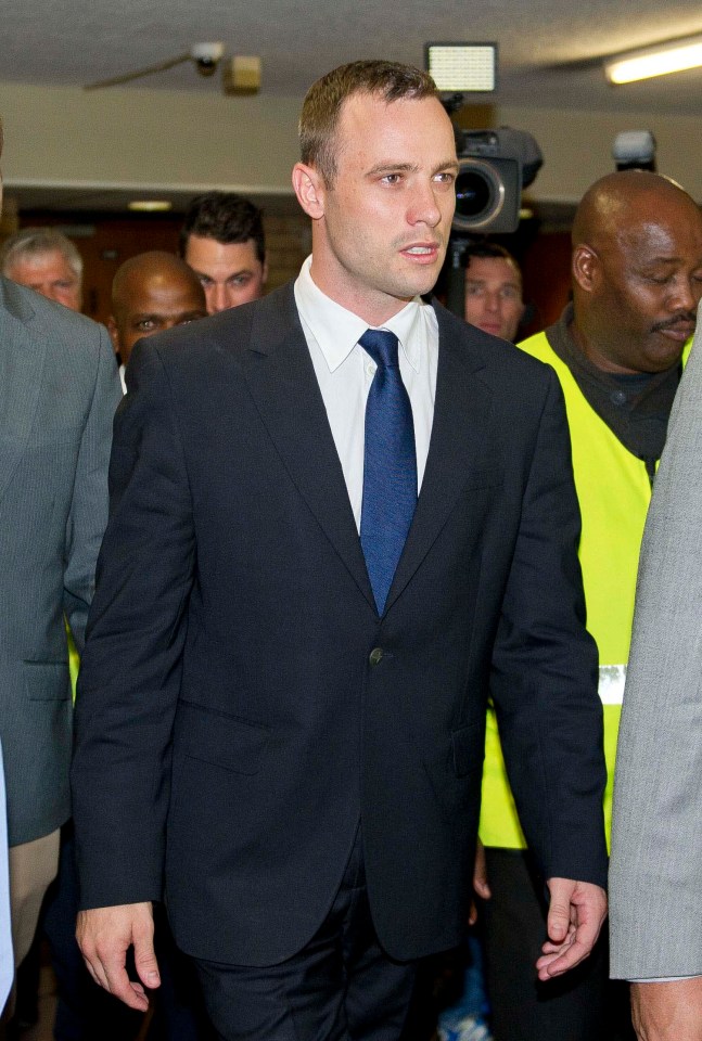 Oscar Pistorius leaving the Pretoria High Court.