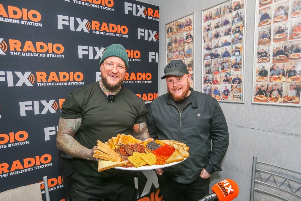 The Bald Builders posed next to the enormous breakfast