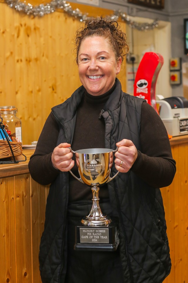 Shelaine Crabtree, owner of The Hungry Hossee, with her trophy