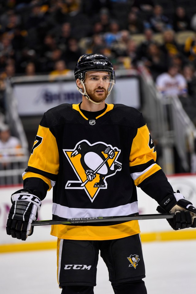 Pittsburgh Penguins left wing Adam Johnson #47 on the ice.