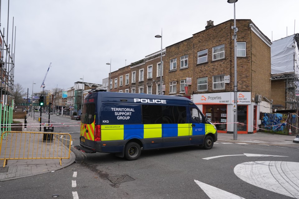 Police at the scene in Acton on Monday