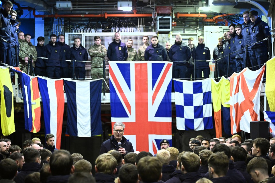 Starmer with military personnel on board of HMS Iron Duke