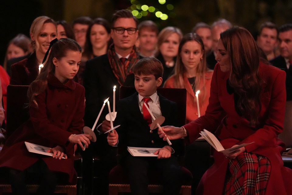 Kate helping the children light their candles