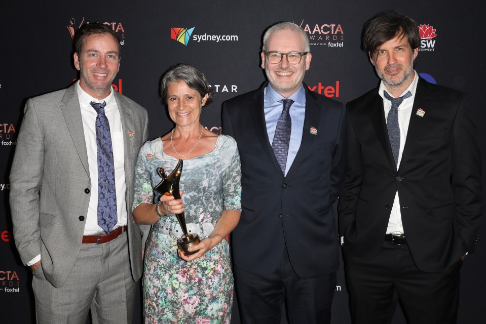 Bluey creators accepting an AACTA Award.