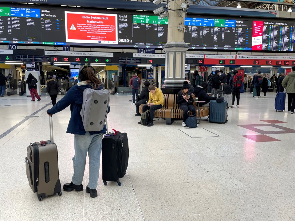 Rail passengers at Victoria Station in central London