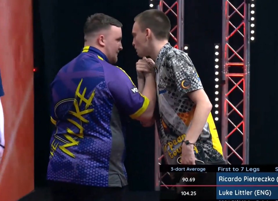 Pietreczko appeared to square up to Littler during the Belgian Darts Open