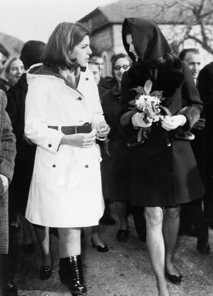 Jackie Onassis (right) walking with her stepdaughter, Tina, at Nydri Village of Lefkas Island