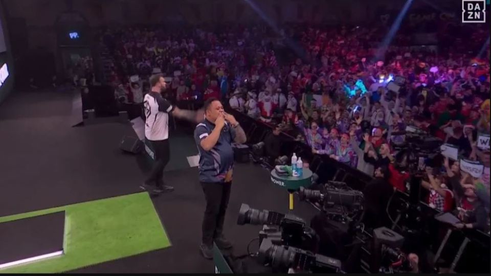 Ross Smith threw his darts into the Ally Pally crowd following shock defeat to Paolo Nebrida