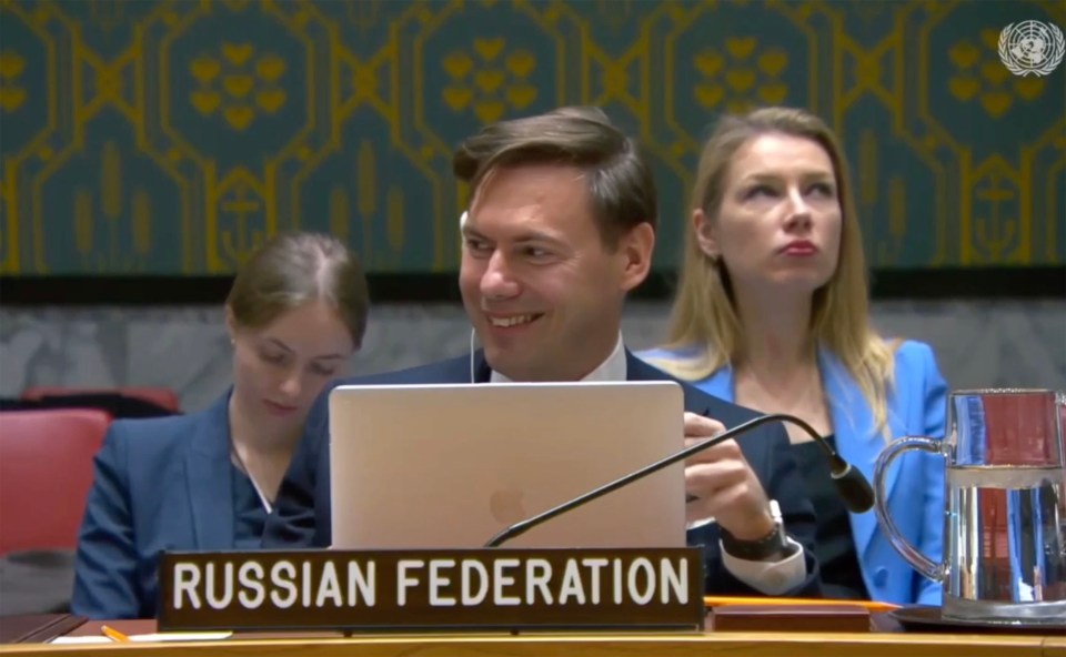 Roman Kashaev chuckles while listening to Daria Zarivna’s story about four members of a family being wiped out