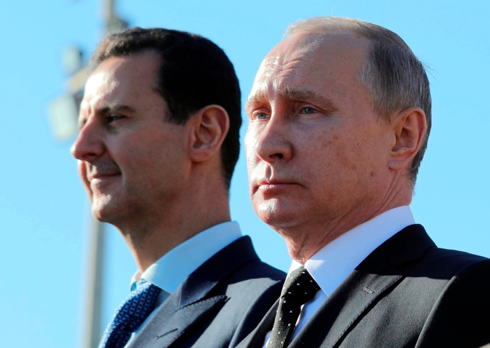 Vladimir Putin and Bashar al-Assad.