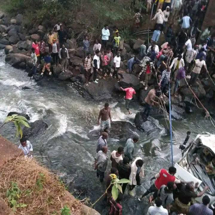 People waded into the river to help