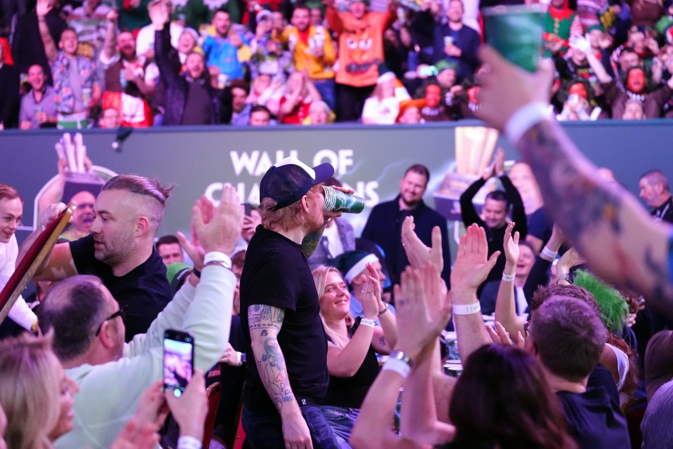 Sheeran's antics went down a treat with the darts faithful