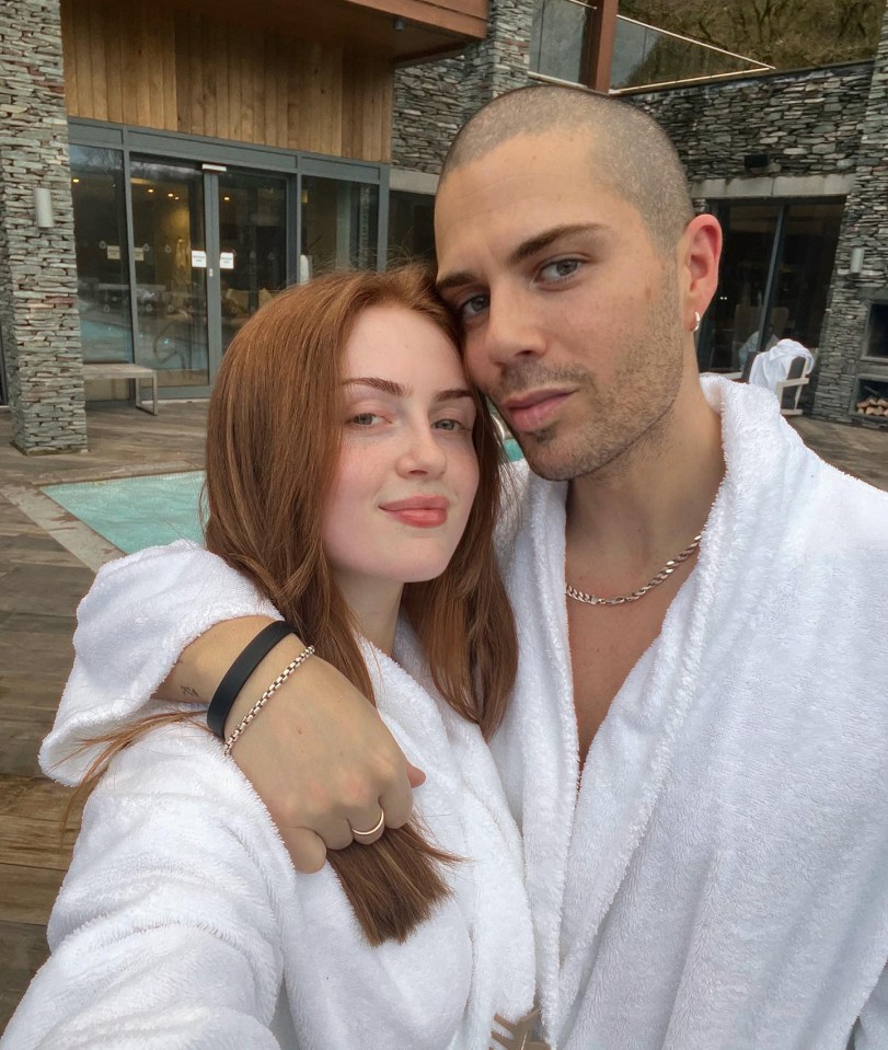 Couple in bathrobes at a spa.