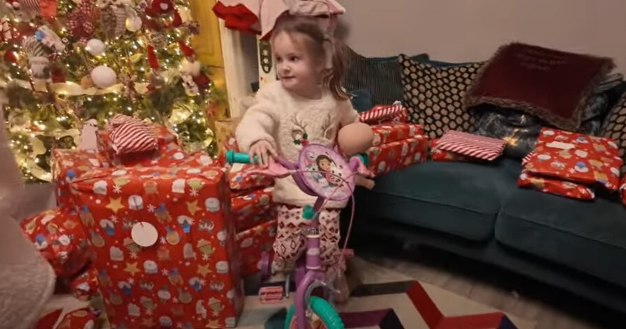 Heidie looked delighted with her new Gabby's Dollhouse bike