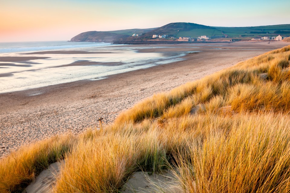 Sunset on the beautiful beach at Croyde on the North Devon Coast, one of the county's many great spots for surfing