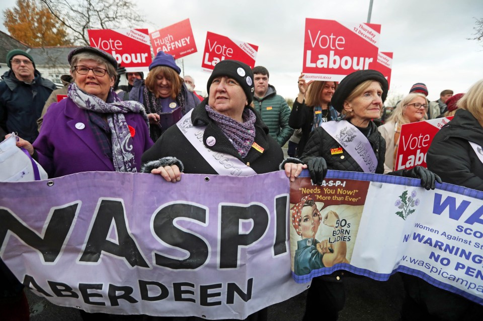 WASPI supporters holding a banner at a Labour Party political event.