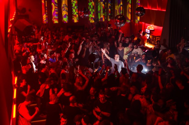 Sven Väth DJing at a crowded Akasha Ibiza nightclub.