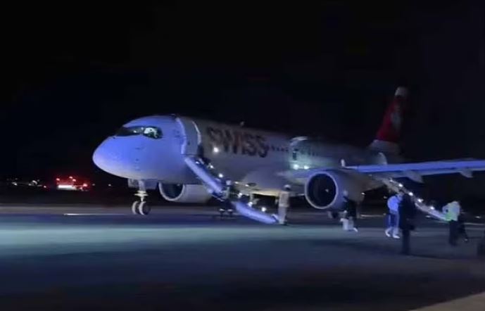 Swiss Airlines plane on the tarmac after an emergency landing due to engine problems.