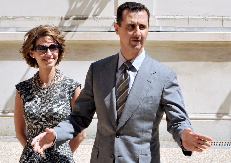 Bashar al-Assad and his wife Asma arrive at the Elysee Palace in Paris on July 14, 2008