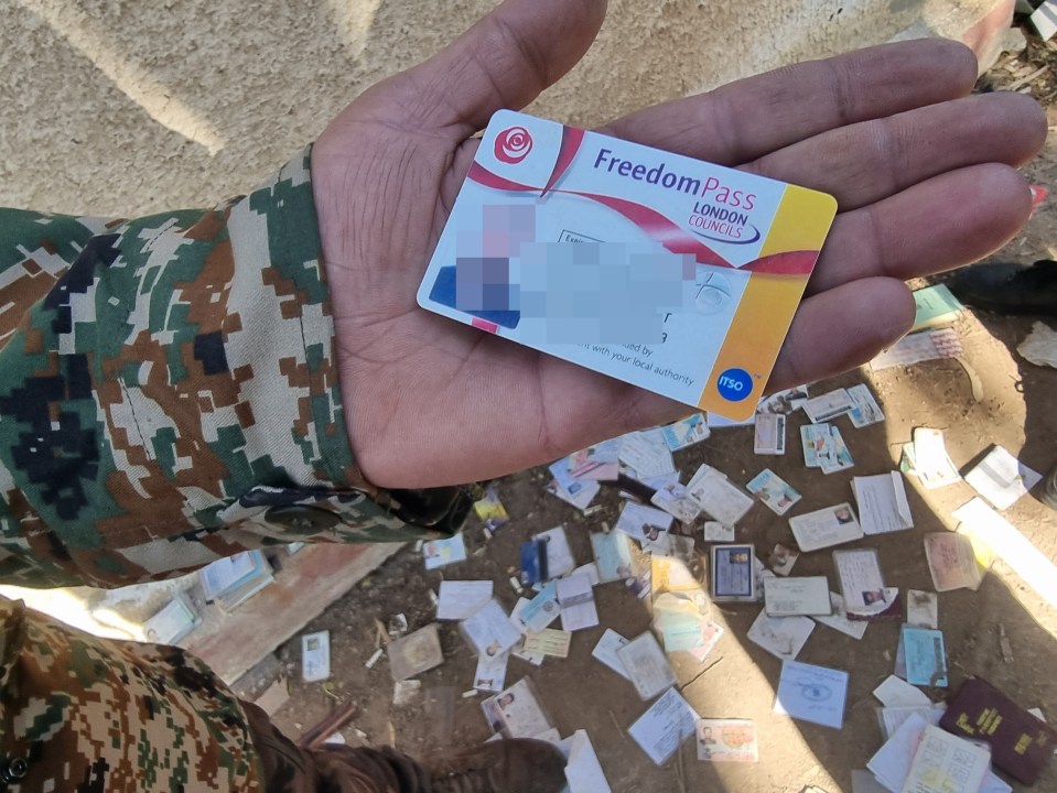 HTS forces show a Freedom Pass for a London resident found inside a 'human slaughterhouse'