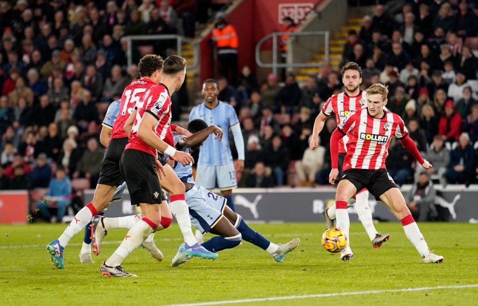 Pape Matar Sarr scoring a goal during a soccer match.