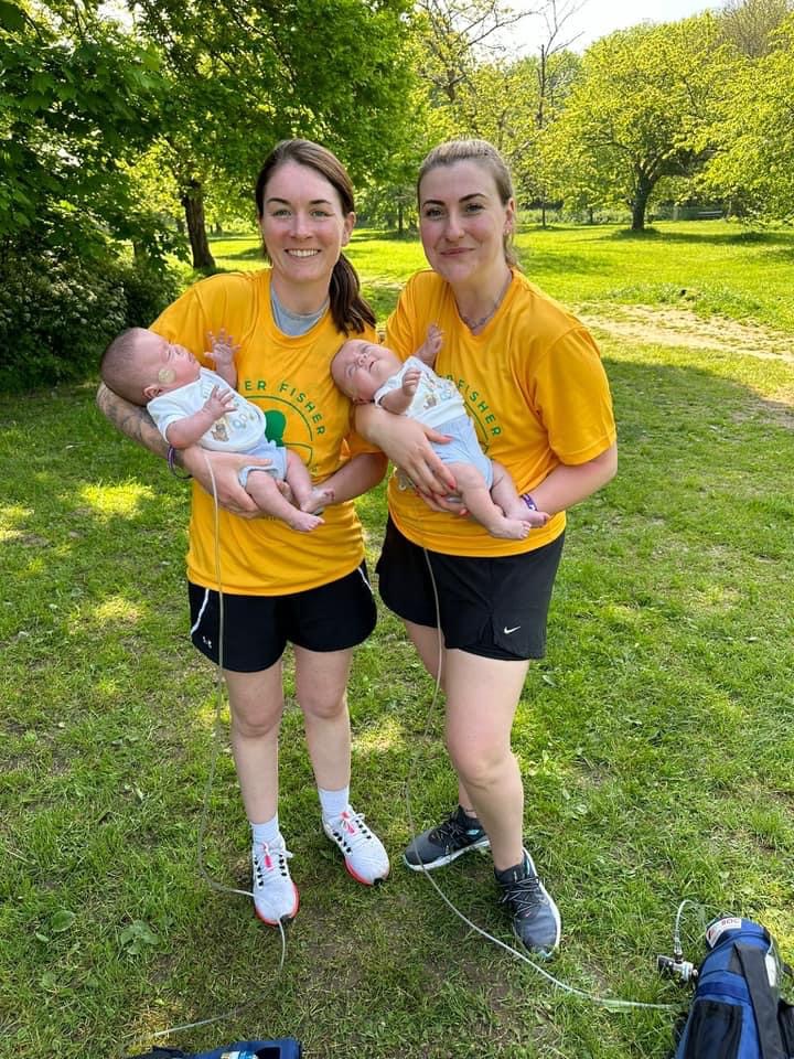 Emma (left) and Lucy with the boys at a charity run for the Oliver Fisher Trust