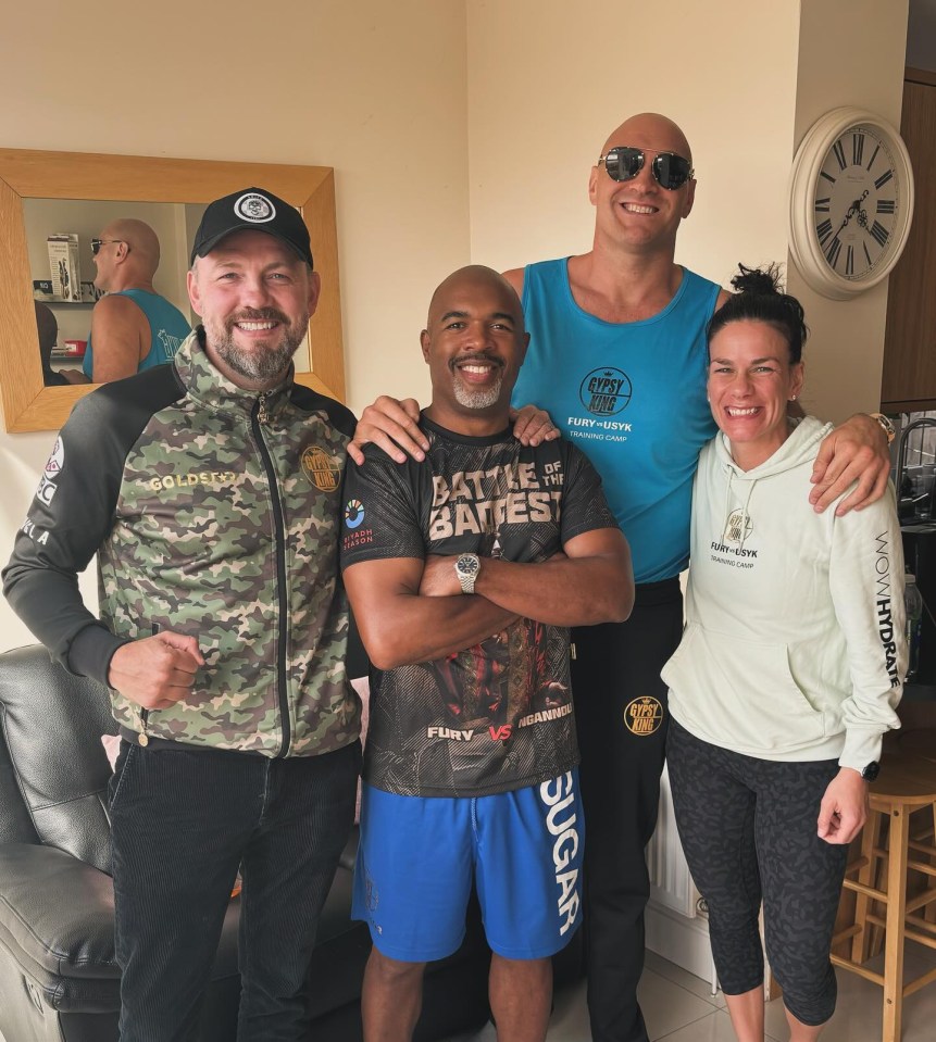 Tyson Fury with his trainers Andy Lee and SugarHill Steward.