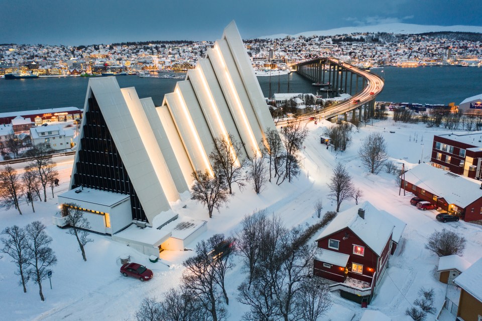 The Ishavskatedralen (Arctic Cathedral) and Tromso Bridge Tromsobrua, Norway