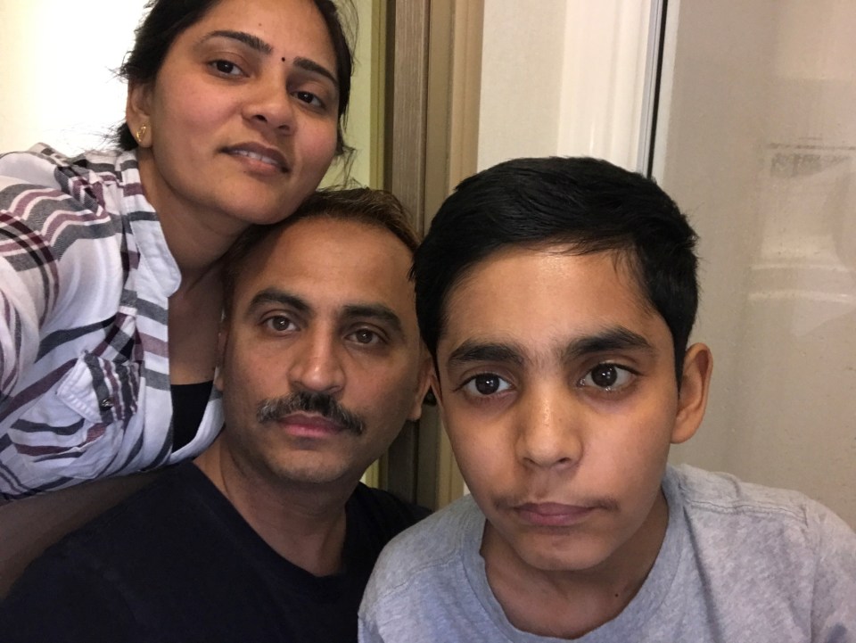 The youngster with his mum Namrata and dad Bhavesh