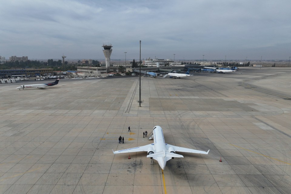 A UN plane on the tarmac at Damascus International Airport