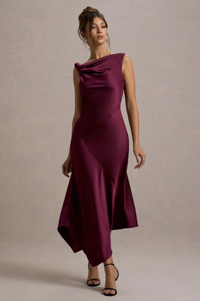 Model wearing a burgundy cowl neck midi dress.