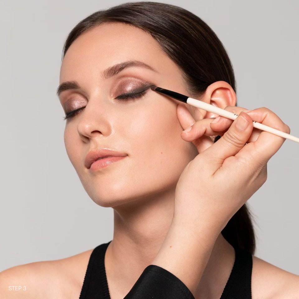 Beauty guru Bobbi Brown explained that a black eye pencil is 'a good switch for evening' (stock image)