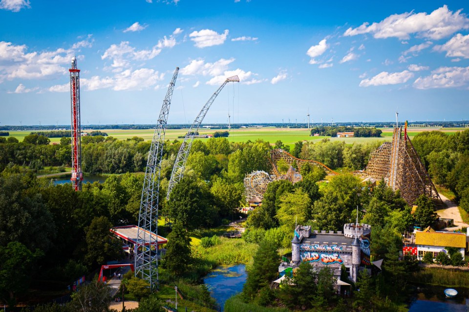 Aerial view of Walibi Holland amusement park, showing several rides and attractions.