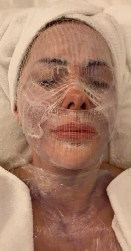 Woman receiving a facial treatment.