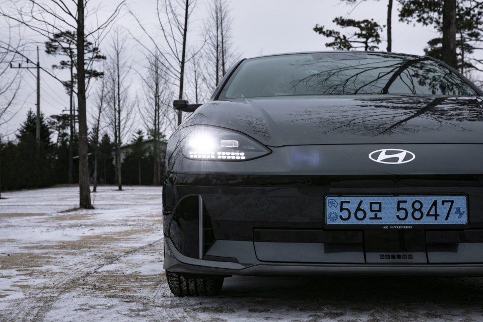 Close-up of a black Hyundai Ioniq 6 electric vehicle.