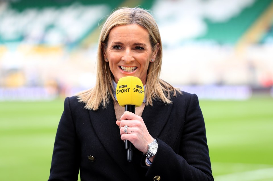 Woman holding a Premier League Amazon microphone.