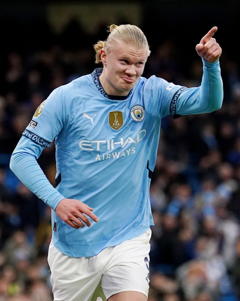 Erling Haaland in Manchester City uniform celebrating.