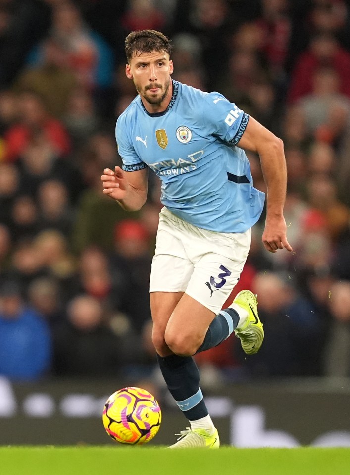 Ruben Dias playing soccer.