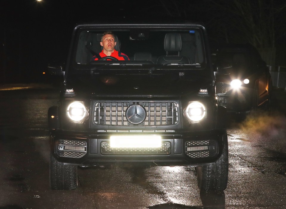 Darren Fletcher in a car at night.