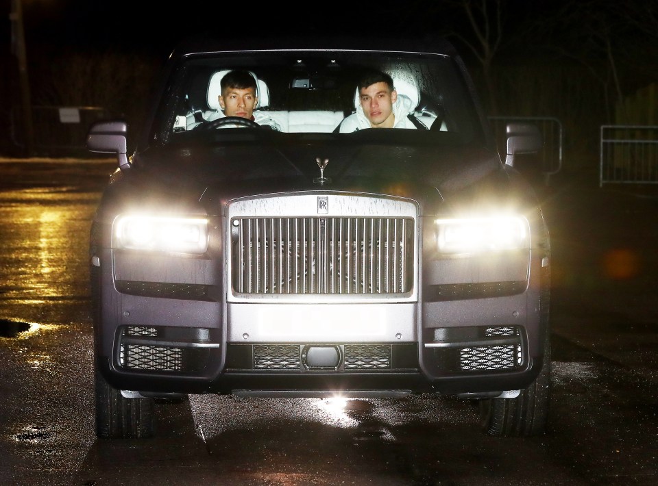 Lisandro Martinez and Manuel Ugarte in a Rolls Royce Cullinan.