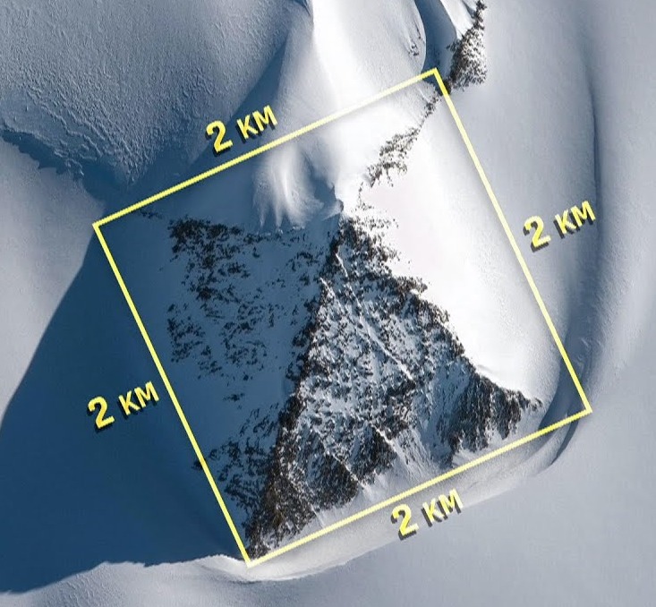 Aerial view of a pyramid-shaped structure in Antarctica, measuring 2km x 2km.