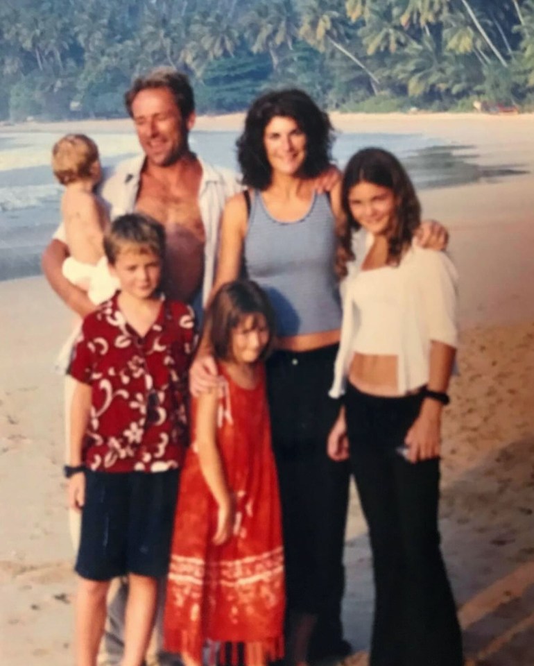 Family photo on a beach.