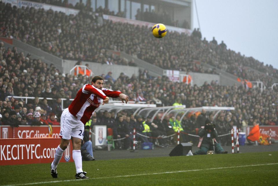 Rory Delap of Stoke City throwing the ball in during a soccer match.